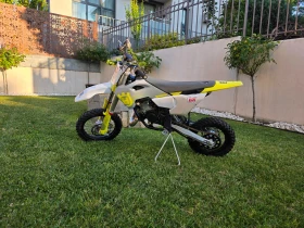 ������ Husqvarna TC