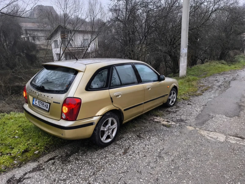 Mazda 323 323f BJ, снимка 2 - Автомобили и джипове - 48351524