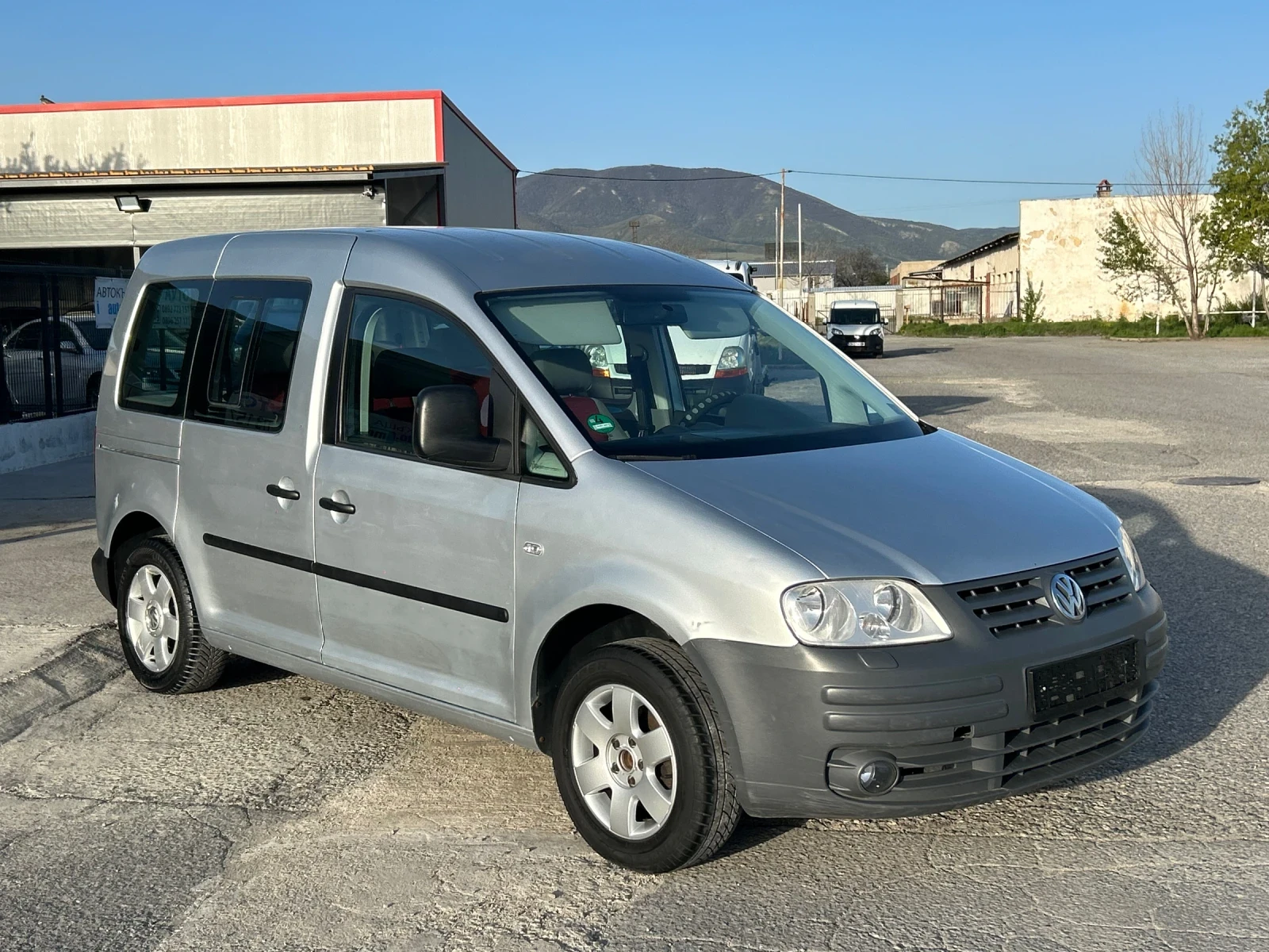 VW Caddy 1.6 Бензин-Метан Пътнически  - изображение 4