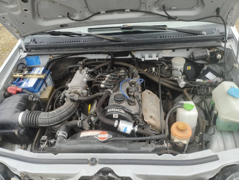 Suzuki Jimny 1.3i 16v, снимка 12 - Автомобили и джипове - 53244173