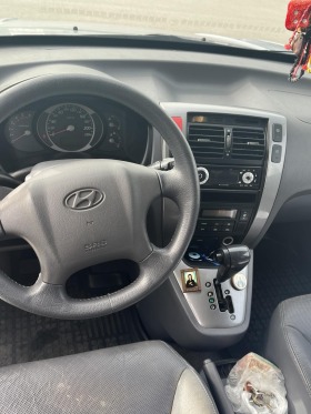 Hyundai Tucson, снимка 11 - Автомобили и джипове - 45606027