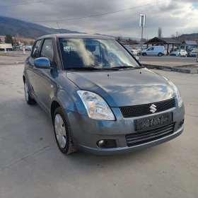 Suzuki Swift 1.3i* 4X4* 90kc* КЛИМАТИК*  - 5299 лв. / 2709.34 € - 45281036 3