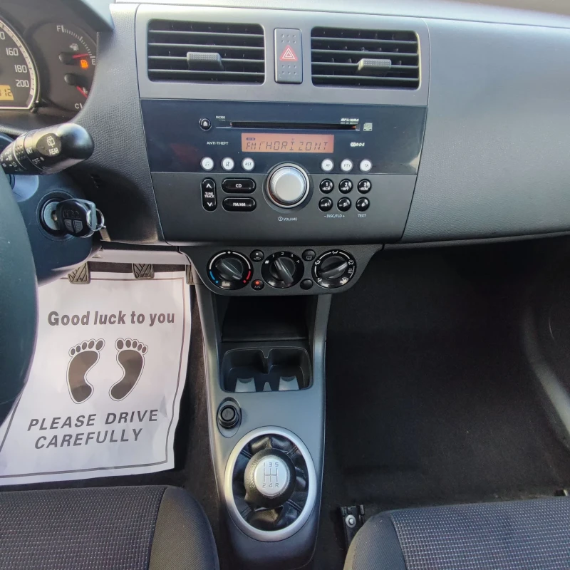 Suzuki Swift 1.3i* 4X4* 90kc* КЛИМАТИК* , снимка 11 - Автомобили и джипове - 52920031