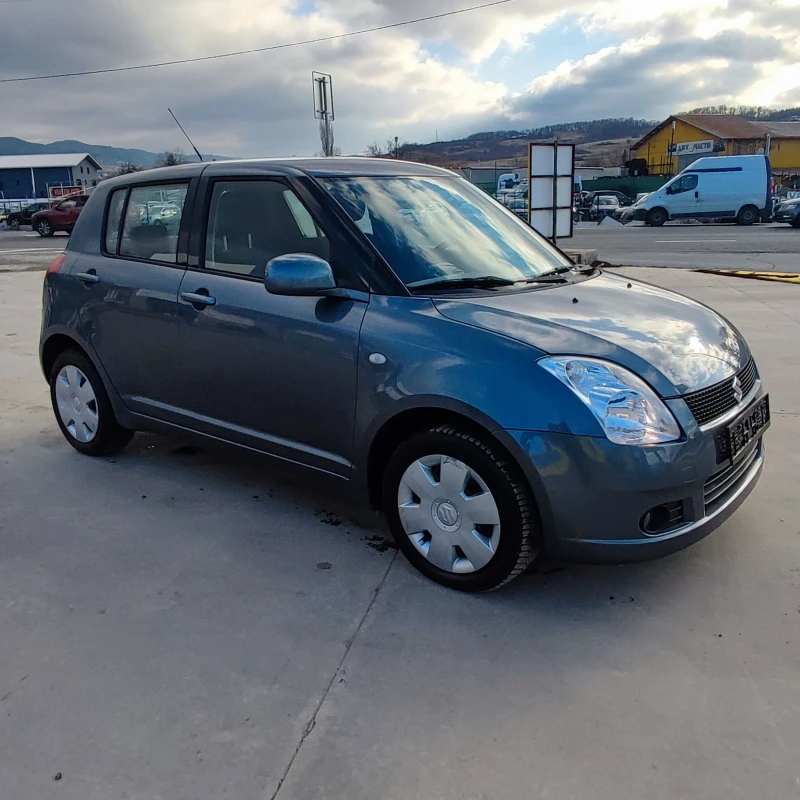 Suzuki Swift 1.3i* 4X4* 90kc* КЛИМАТИК* , снимка 4 - Автомобили и джипове - 52920031
