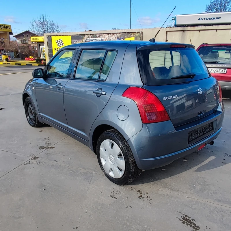Suzuki Swift 1.3i* 4X4* 90kc* КЛИМАТИК* , снимка 7 - Автомобили и джипове - 52920031