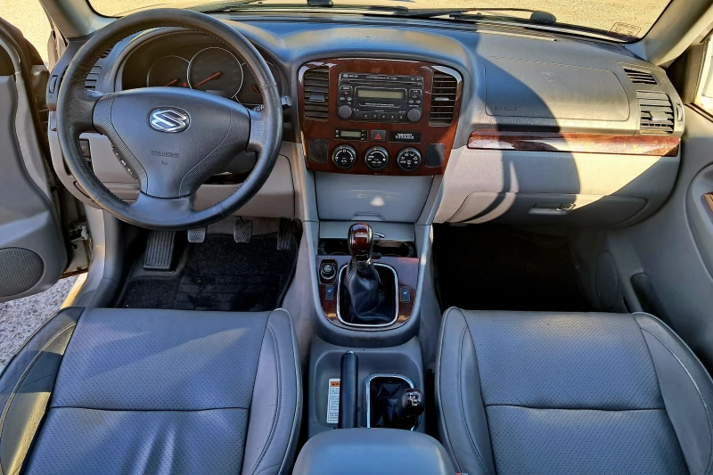 Suzuki Grand vitara, снимка 11 - Автомобили и джипове - 47885039