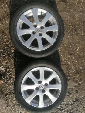 Гуми с джанти Toyo 185/55R15, снимка 1 - Гуми и джанти - 48933903