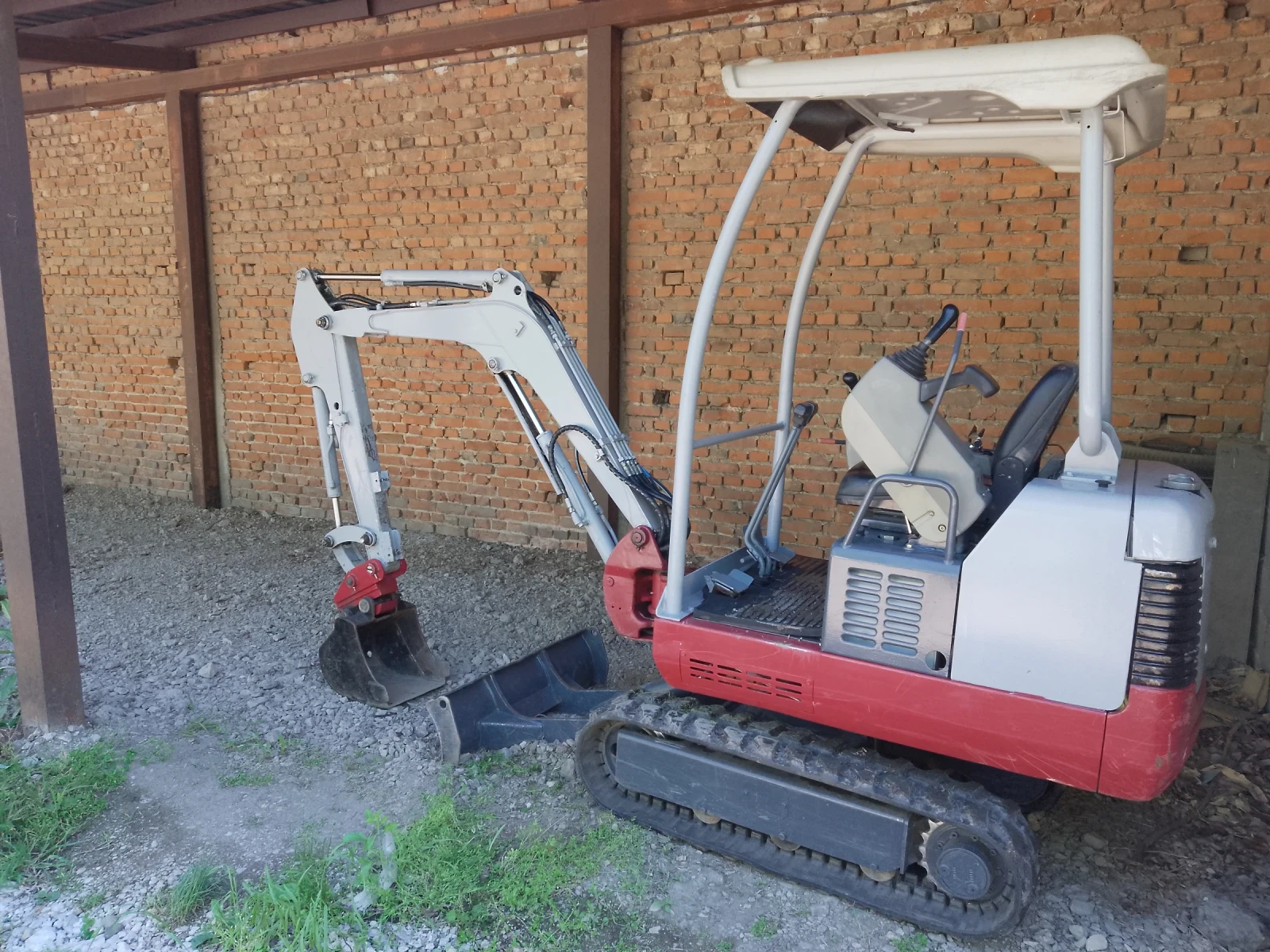 Багер Takeuchi Takeuchi TB014