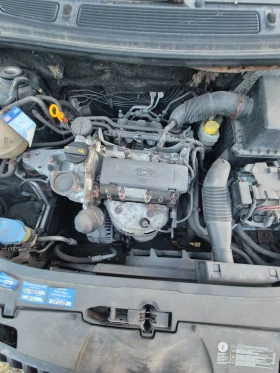 Skoda Roomster 1.2 HPT, снимка 13