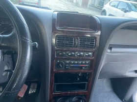 SsangYong Korando 2.0 бензин 128кс клима уникат без точка ръжда, снимка 8