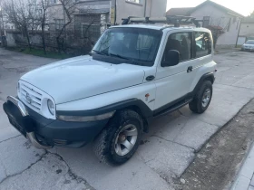 SsangYong Korando 2.0 бензин 128кс клима уникат без точка ръжда, снимка 2