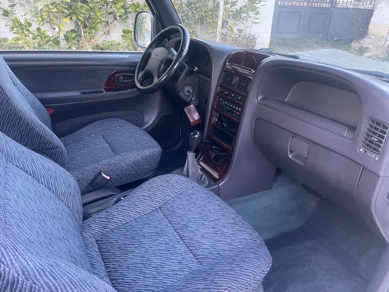 SsangYong Korando 2.0 бензин 128кс клима уникат без точка ръжда, снимка 6 - Автомобили и джипове - 53405566