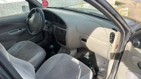 Ford Fiesta 1.4i, снимка 6 - Автомобили и джипове - 53608571