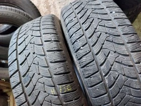 Гуми Зимни 235/60R18, снимка 2 - Гуми и джанти - 38496532