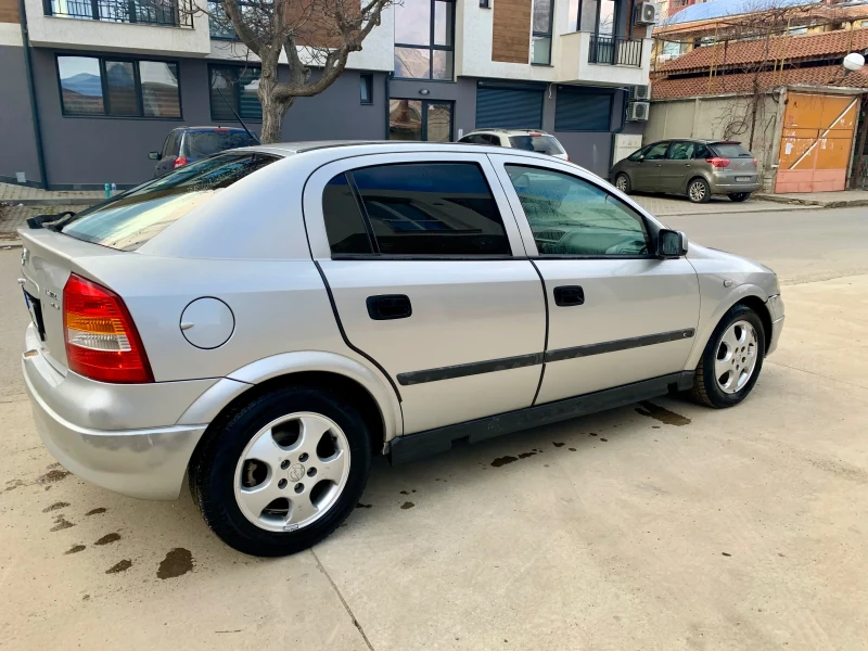 Opel Astra, снимка 1 - Автомобили и джипове - 48999258