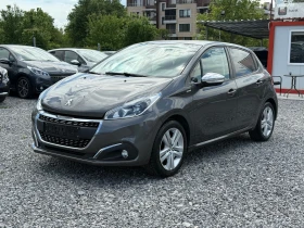 ������ Peugeot 208
