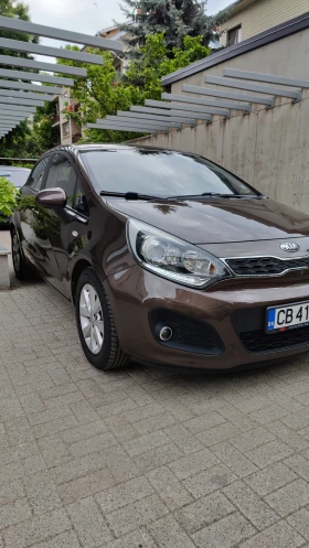 ������ Kia Rio