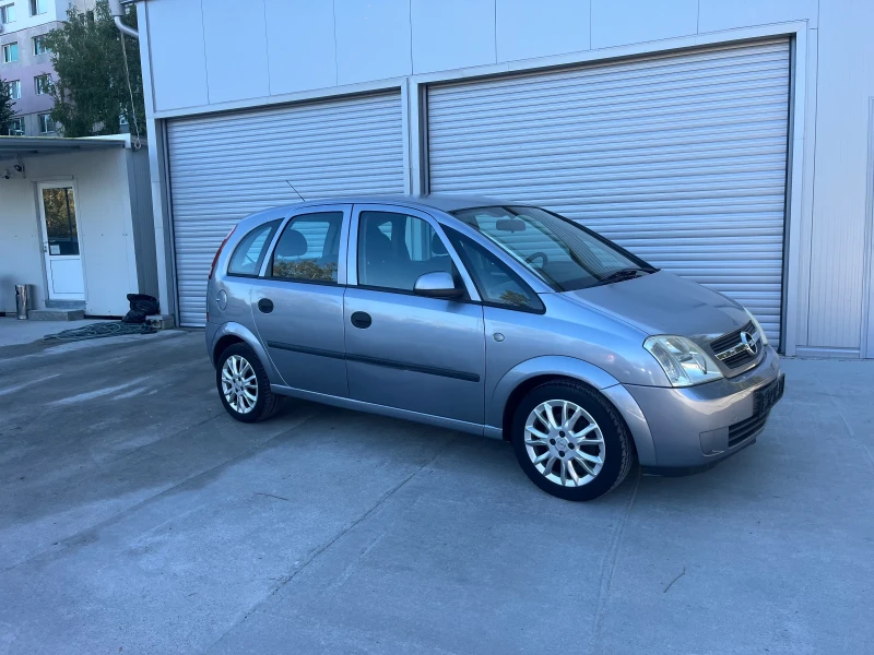 Opel Meriva 1.6 газ, снимка 14 - Автомобили и джипове - 47679707