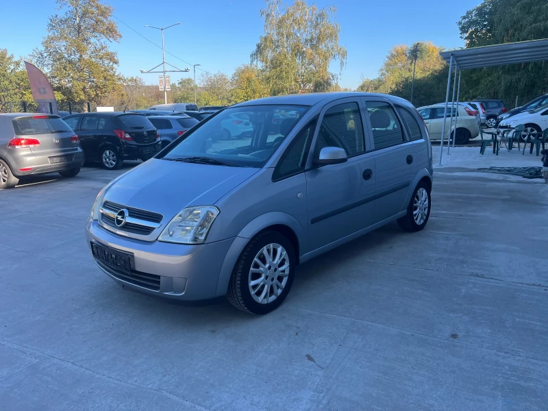 Opel Meriva 1.6 газ, снимка 16 - Автомобили и джипове - 47679707