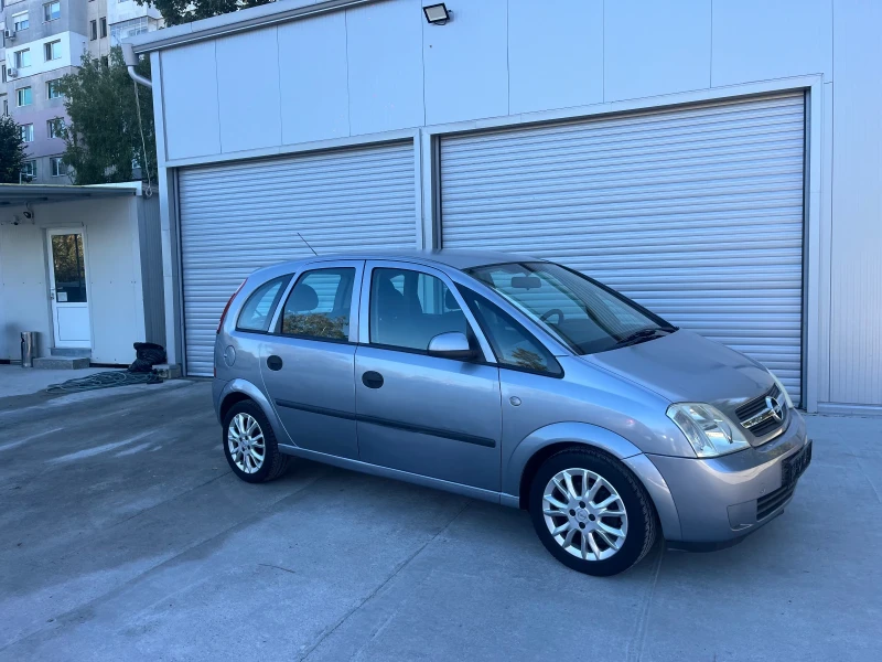 Opel Meriva 1.6 газ, снимка 15 - Автомобили и джипове - 47679707