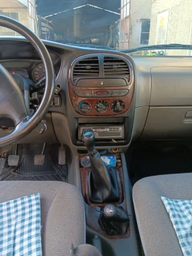 Kia Sportage 1.6 бен-Гас, снимка 7