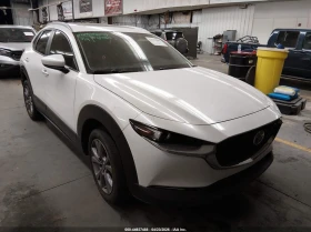 ������ Mazda CX-30