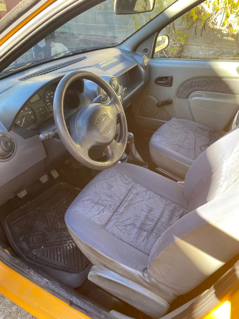 Dacia Logan, снимка 7 - Автомобили и джипове - 52649172