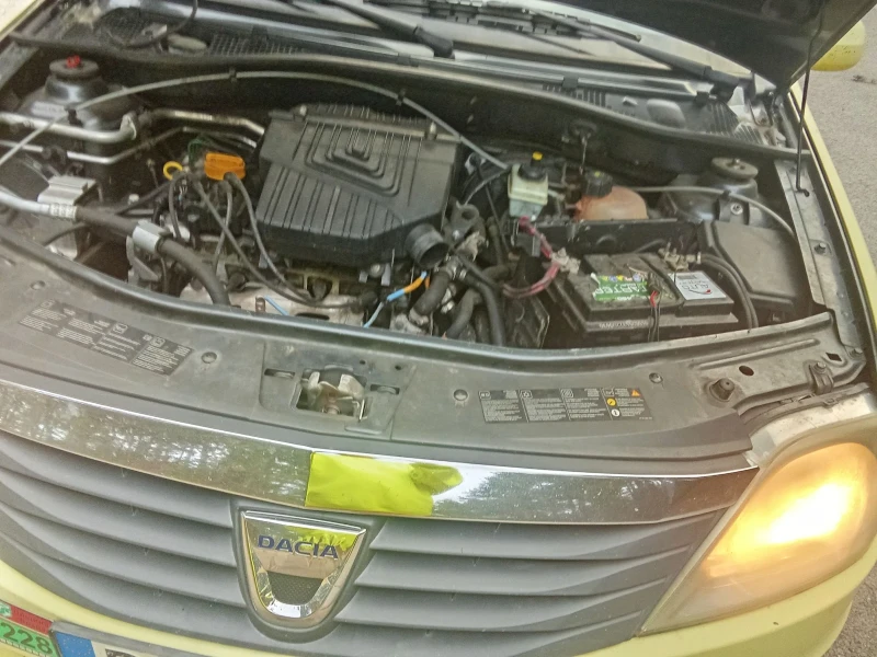 Dacia Logan, снимка 9 - Автомобили и джипове - 52941575