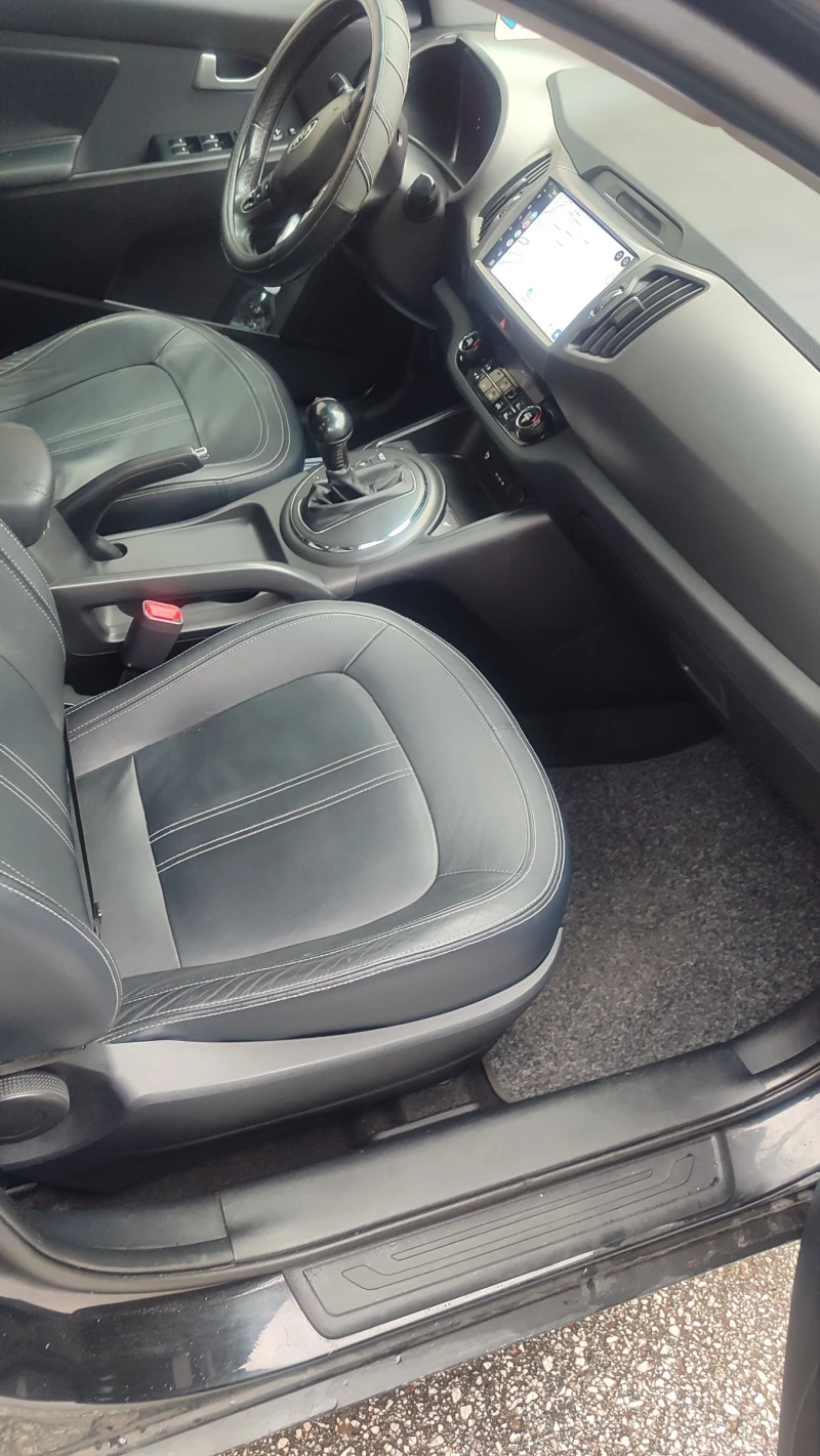 Kia Sportage, снимка 12 - Автомобили и джипове - 52679391