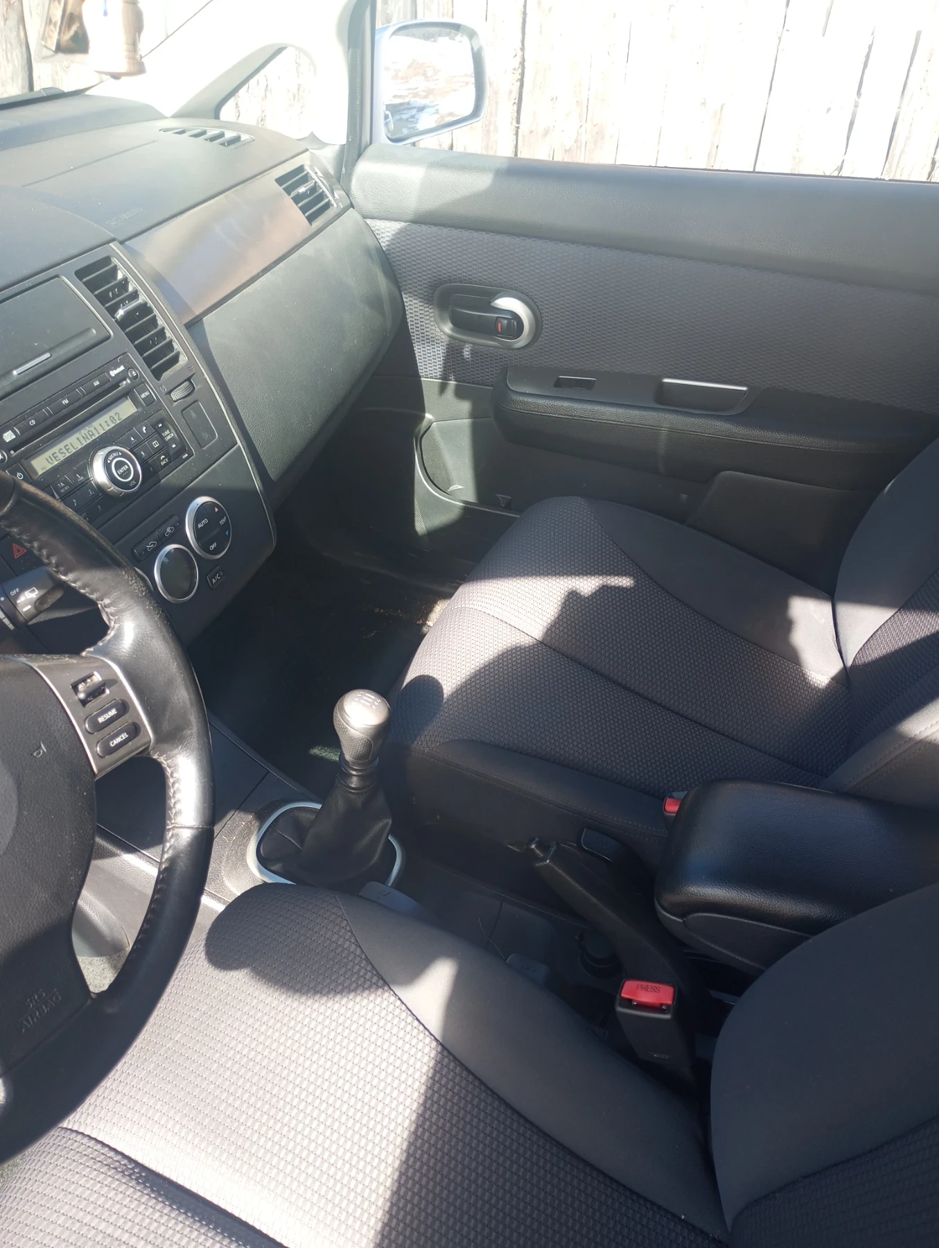 Nissan Tiida  - изображение 4