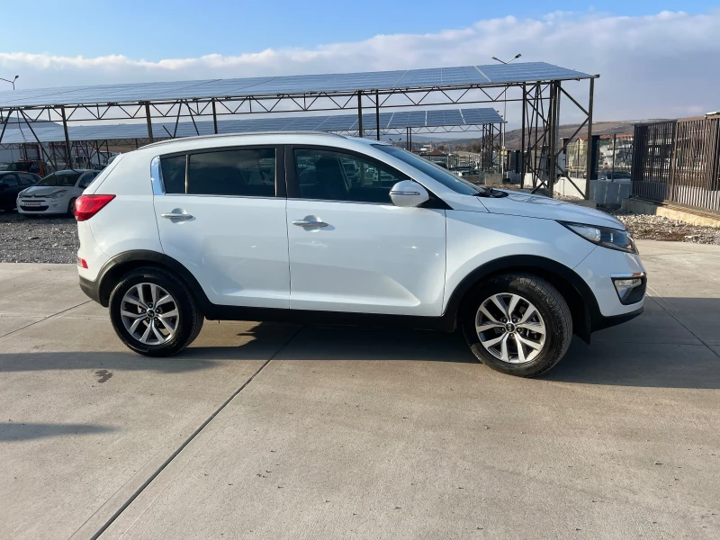 Kia Sportage 1.6i/GPL, снимка 8 - Автомобили и джипове - 49215475