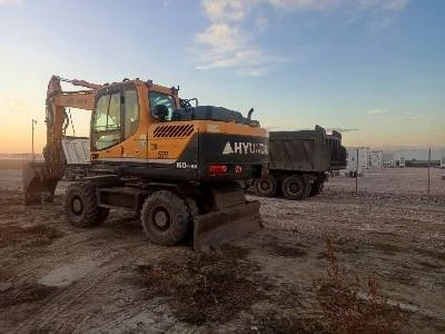 Багер Hyundai 16