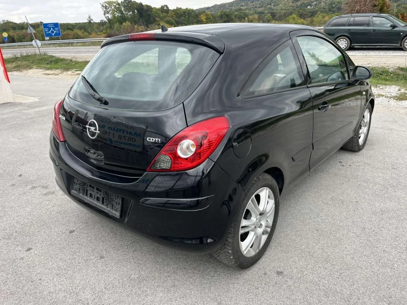 Opel Corsa 1.3CDTI 75кс EURO 4 КЛИМАТИК, снимка 4 - Автомобили и джипове - 52030720