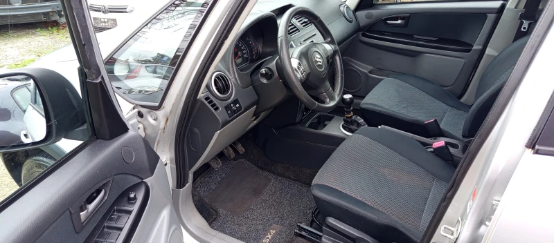 Suzuki SX4 1.9DDIS 4X4 KEYLESS NAVI , снимка 10 - Автомобили и джипове - 52695222