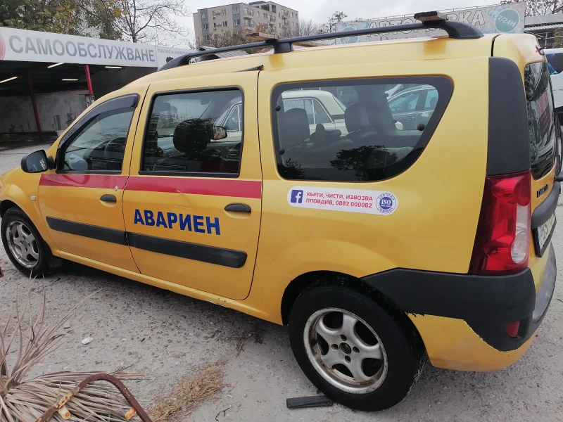 Dacia Logan, снимка 17 - Автомобили и джипове - 48403302