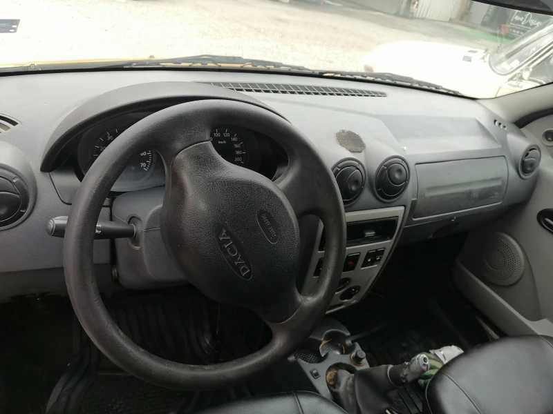 Dacia Logan, снимка 13 - Автомобили и джипове - 48403302