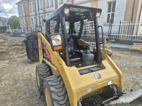 Мини челни товарачи Cat 216B3, снимка 1