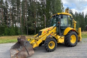 Багер New Holland  - изображение 1