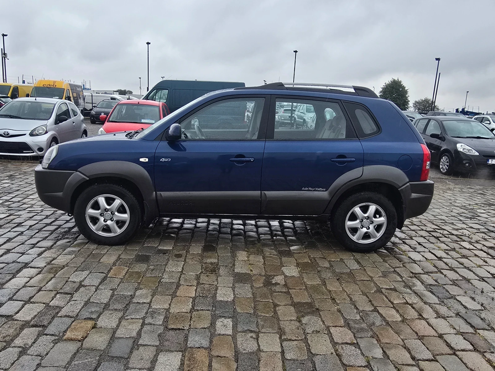 Hyundai Tucson 2.0CDRDI 113кс 4x4 132000 км. - изображение 4
