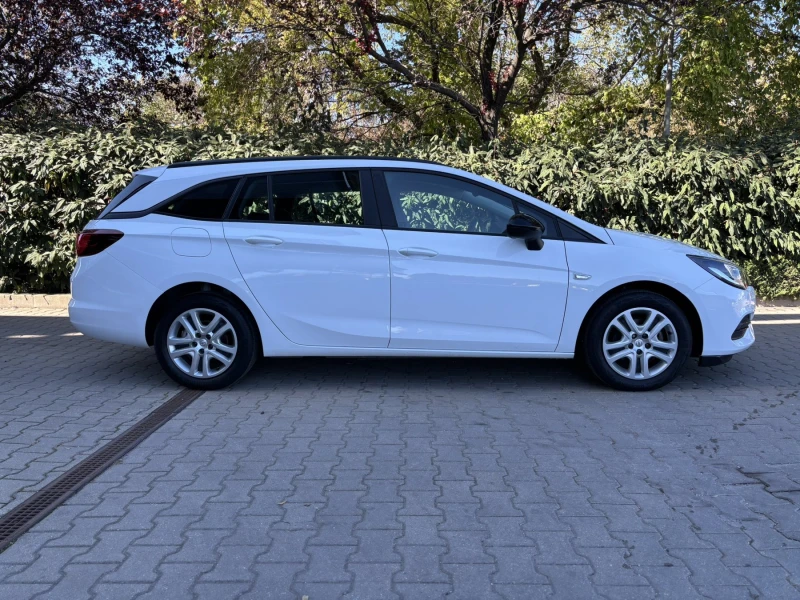 Opel Astra Elegance Sports Tourer, снимка 4 - Автомобили и джипове - 48051909