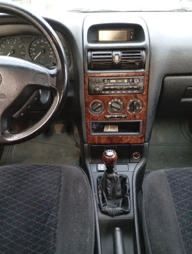 Opel Astra 1.8 Газ-бензин , снимка 9
