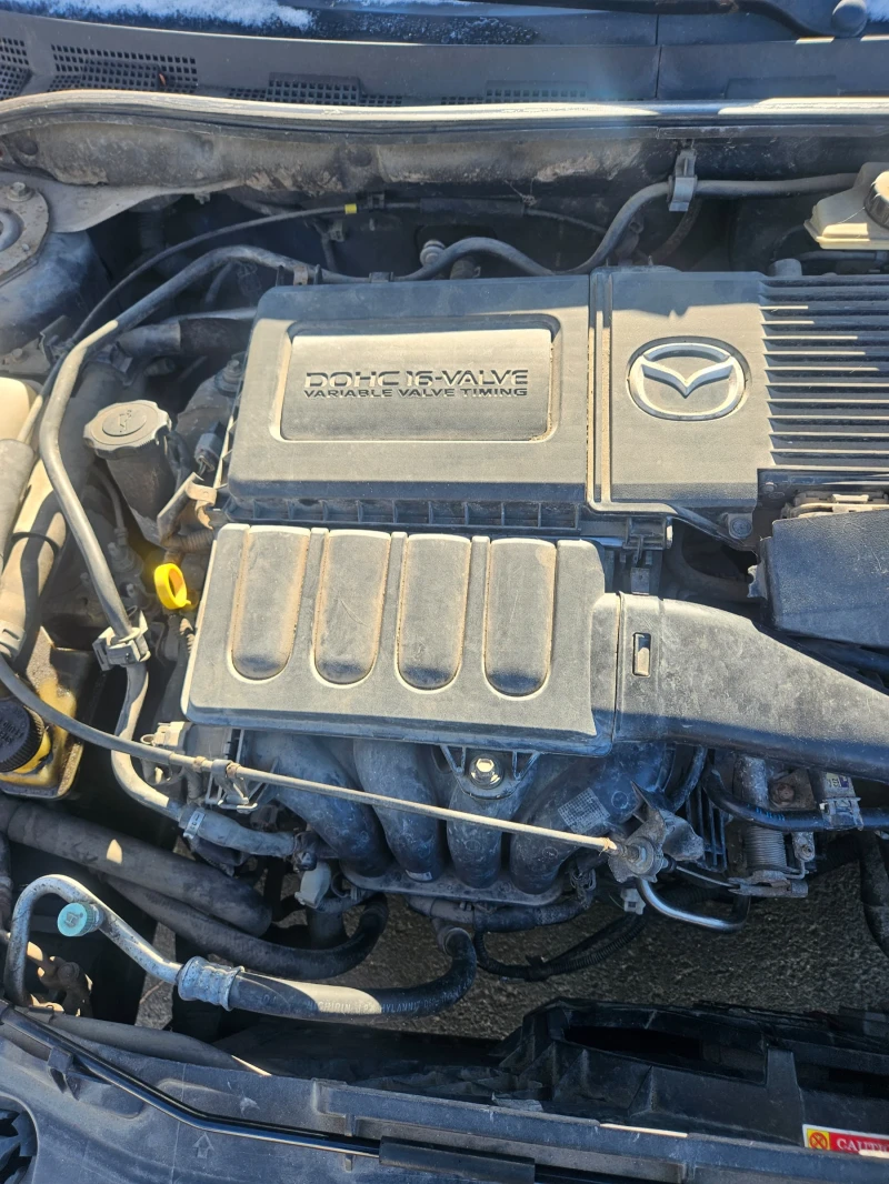 Mazda 3 1.6i, снимка 4 - Автомобили и джипове - 53086466