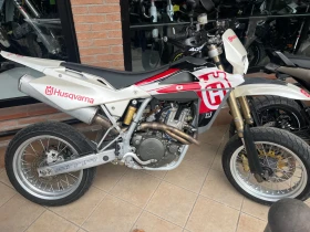 ������ Husqvarna SM