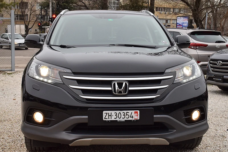 Honda Cr-v 2.2ШВЕЙЦАРИЯ-КОЖА/НАВИ/КСЕНОН/ДВД/ПАНОРАМА/МЕМОРИ, снимка 2 - Автомобили и джипове - 48539131