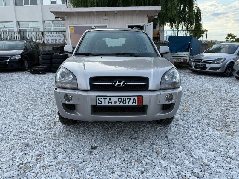 Hyundai Tucson 2.0 dizel 115 kc Aftomat Germania, снимка 13 - Автомобили и джипове - 53294040
