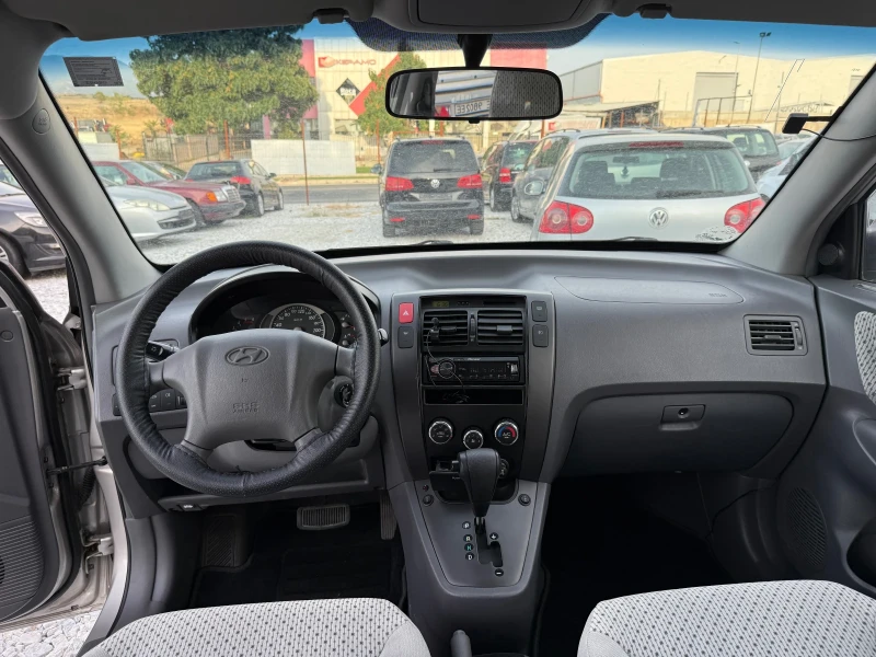 Hyundai Tucson 2.0 dizel 115 kc Aftomat Germania, снимка 8 - Автомобили и джипове - 53294040