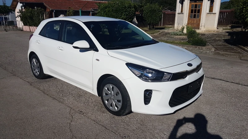 Kia Rio 1.4 16V80кс навигация, снимка 1 - Автомобили и джипове - 46843478