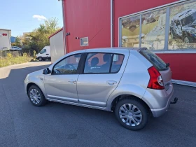 Обява за продажба на Dacia Sandero 1.4. 16v.бензин ~5 099 лв. - изображение 5 | Auto.bg Обява за продажба на Dacia Sandero 1.4. 16v.бензин ~5 099 лв. - изображение 5
