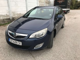 Opel Astra Tourer, снимка 1 - Автомобили и джипове - 45285422