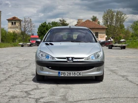 ������ Peugeot 206